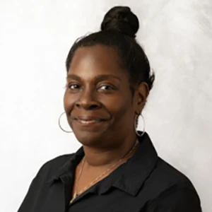 A headshot photo of chiropractic assistant Nicole Snow of Rhodes Chiropractic