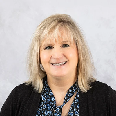 A headshot photo of Billing and Account Specialist Robin Sweet of Rhodes Chiropractic