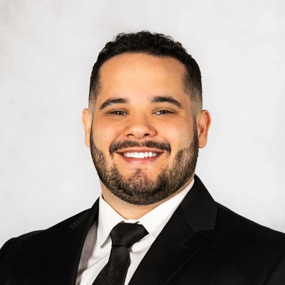 A headshot photo of Dr. Benjamin DePass of Rhodes Chiropractic