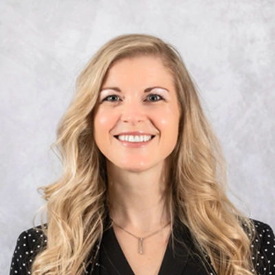 A headshot photo of Dr. Breanne Rhodes from Rhodes Chiropractic