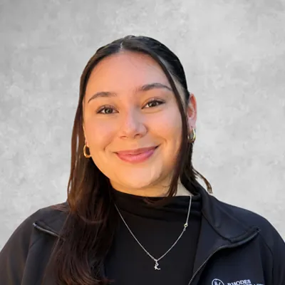 Keila Galindo Receptionist at Rhodes Chiropractic smiling
