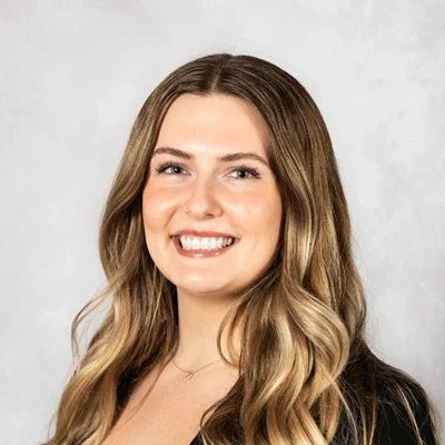 Chiropractic Tigard OR Marin Penney Team A headshot photo of marketing and events coordinator Marin Penney of Rhodes Chiropractic